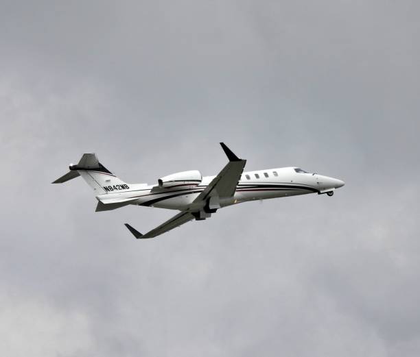 LEARJET INC. Model: 45 Boca Raton, Palm Beach County, Florida, USA. December 28, 2021: A Learjet fixed wing multi engine (12 seats / 2 engines) is taking off from the Boca Raton Airport.
N842MB. MFR. YR: 2001. 2001 stock pictures, royalty-free photos & images