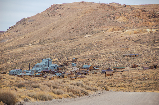 Picture of some of the abandoned buildings left behind in Bodie, California. Bodie is a gold mining town that turned into a ghost town. The whole town was later turned a historical state park. Many people can visit this state park and see the town that was suddenly abandoned.