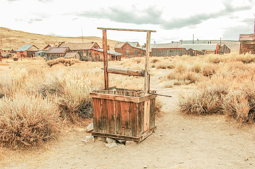 An old abandoned well has stood the test of time. It now stands as a reminder of days gone by. Located in the ghost town of Bodie State Park.