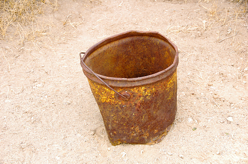 Picture of an old, rusty bucket b