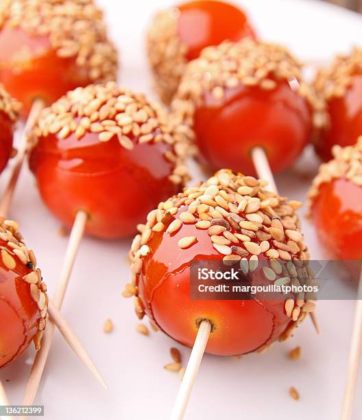 Tomato Like Toffee Apple Stock Photo - Download Image Now - Taffy Apple, Tomato, Cherry Tomato