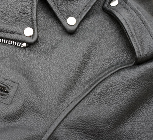 Close up of a black leather biker jacket A black leather biker jacket leather pocket clothing hide stock pictures, royalty-free photos & images