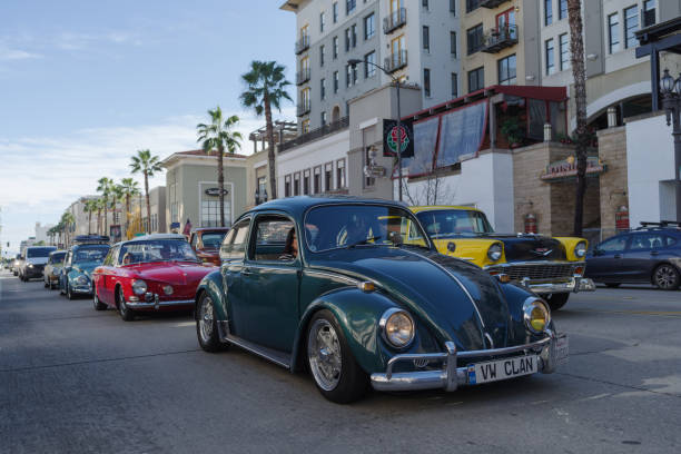 Pasadena, California, USA - December 31, 2021: image of Colorado Boulevard showing classic cars traffic heralding the New Year 2022.