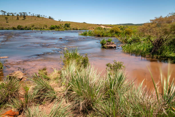 istock Long exposure of river with fields and vegetation around 1362131522