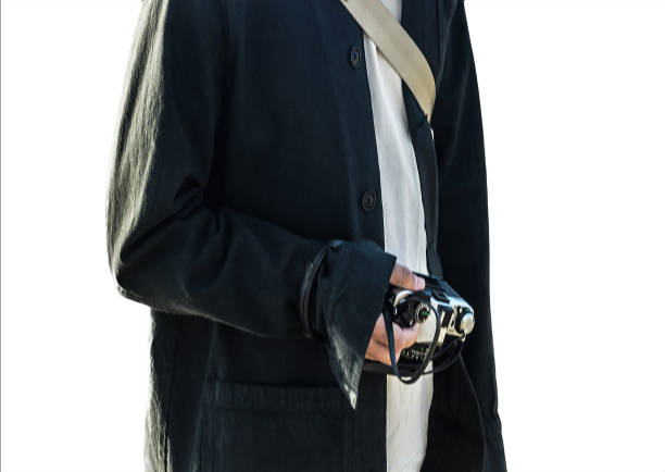 istock unrecognizable photographer man, isolated on white 1362139514