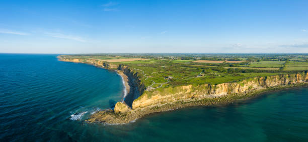 The panoramic view of the Pointe du Hoc in Europe, in France, in Normandy, towards Carentan, in spring, on a sunny day. stock photo