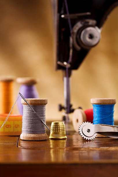 istock small sewing wooden bobbin with other items 136214228