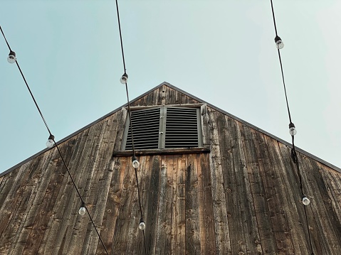 Old barn with distressed wood and string lights in Paso Robles California