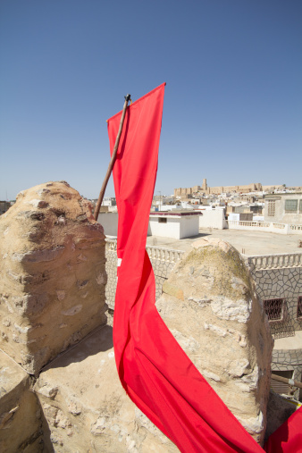 detail of Medina in Sousse, Tunisia with flag