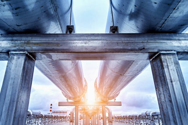 view directly below of transport pipelines - water valve oil gas imagens e fotografias de stock