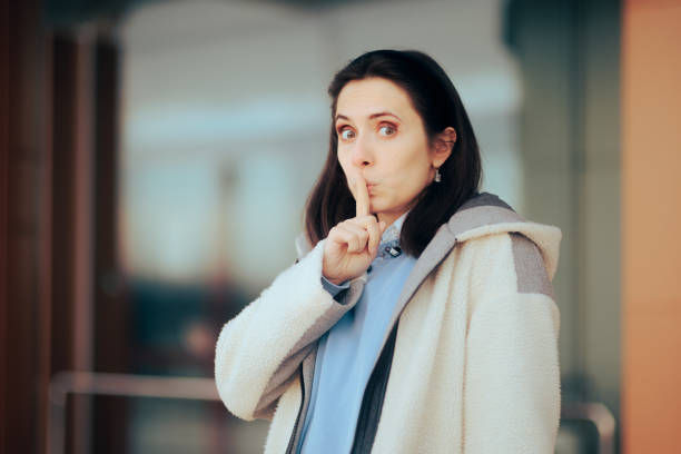 Young person asking for silence irritated by environmental noise