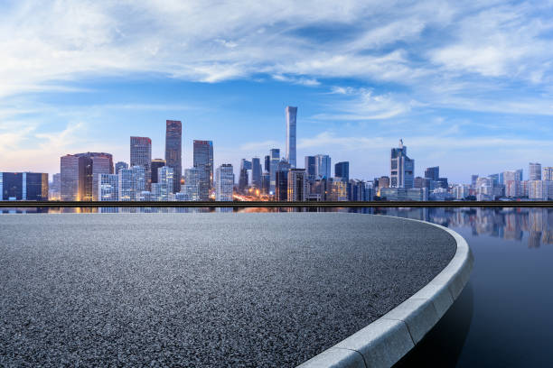 istock Panoramic skyline and modern commercial buildings with empty square 1362158995