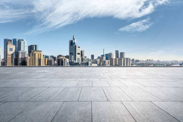 istock Panoramic skyline and modern commercial office buildings with empty floors 1362160553