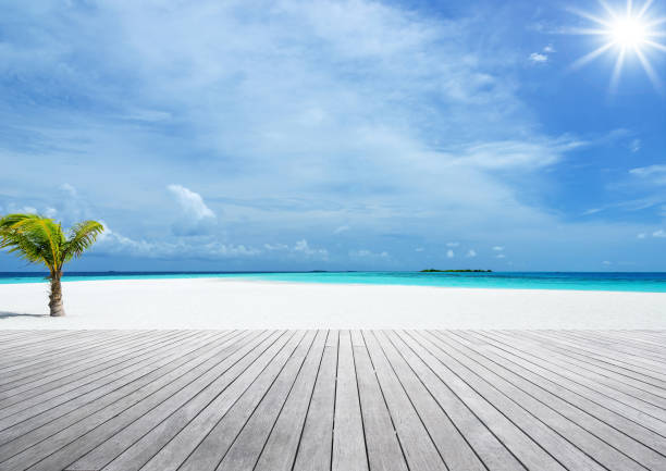istock Empty wooden platform beside tropical beach in the sun 1362161691