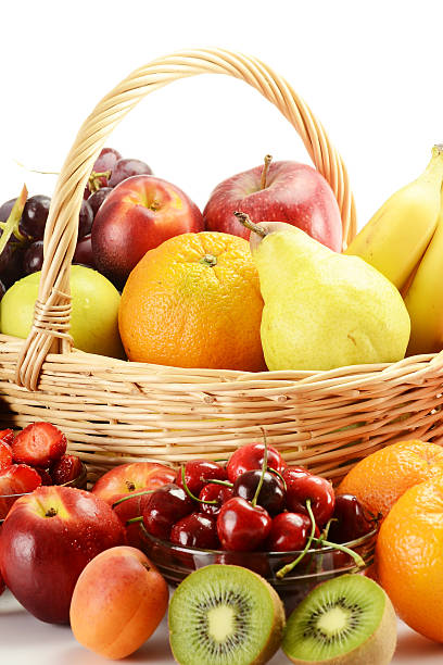 istock Composition with fresh fruits in wicker basket isolated on white 136216553