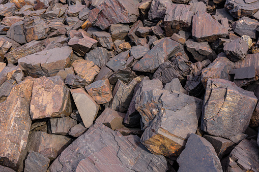 Background of the stones near iron ore quarry
