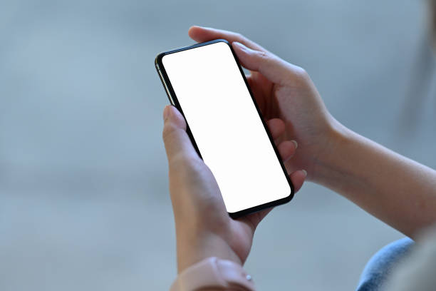 istock Closed up with female hand using smartphone, empty screen of smartphone. 1362176458