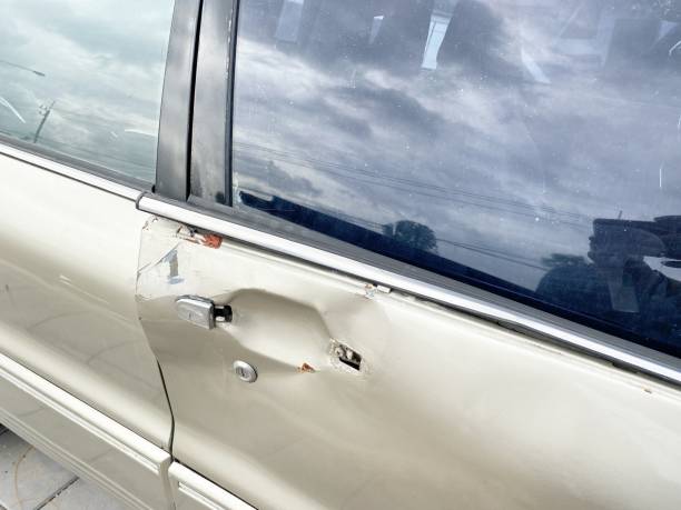 istock crack door car after accident 1362178322