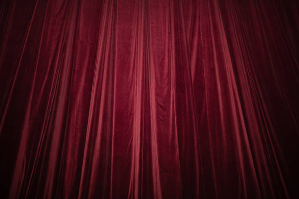 istock Red curtain in theatre 1362183039