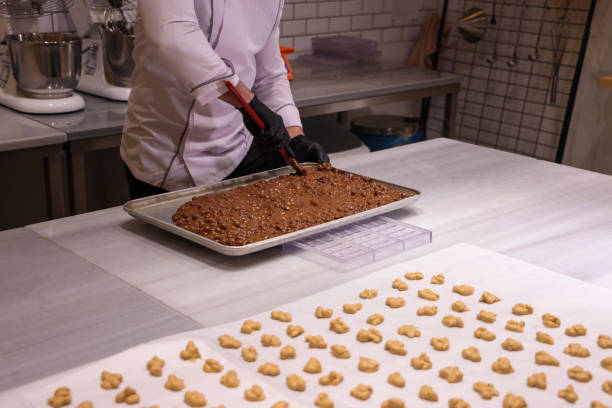 istock A chef is pouring chocolate in a mould. 1362196995