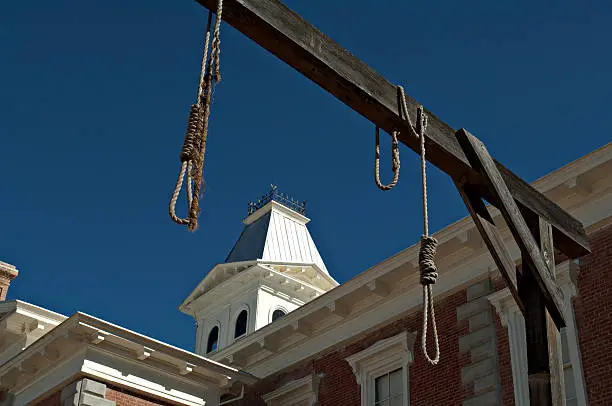 Looking through hanging noose at the county Courthouse, National historical landmark in Tombstone, America's gunfight capital. Arizona, USA