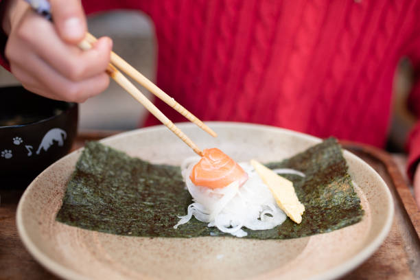 istock A child who makes hand rolled sushi 1362207170