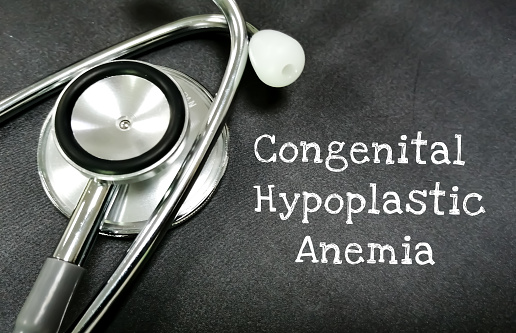 congential hypoplastic anemia text on blackboard with stethoscope, health and medical concept.
