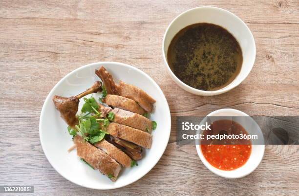 Boiled Duck Meat In Black Soybean Sauce Dipping Spicy Chili Sauce Stock Photo - Download Image Now