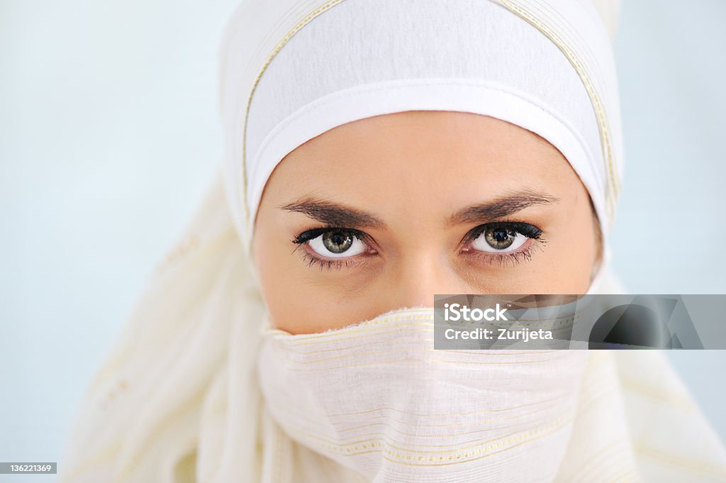 Muslim woman with veil looking at camera Eye Stock Photo