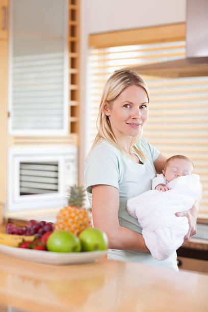 istock Side view of woman standing in the kitchen 136221569