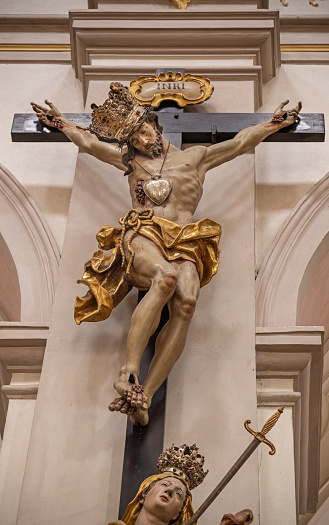 Baroque crucifix in the Pfarrkirche Sankt Peter, known as Alter Peter which is a beloved church in Munich, Germany and is originally build in 1278 with substantial modernizations during the years and has been partly rebuild after World War II bombardments.