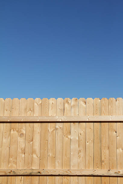 istock New Fence on a Beautiful Blue Sky 136221922