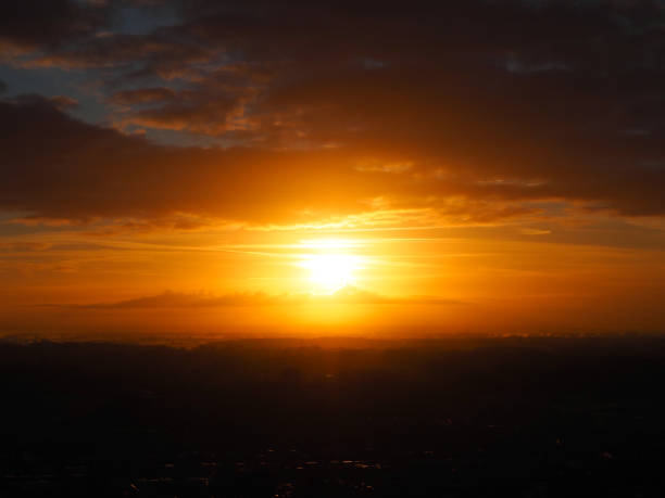 Yellow orange sun in the dark morning
