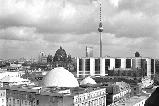 Taken 1987 from on top of the Französischer Dom direction to the old city center of East Berlin. Some buildings are not anymore existing like the one of GDR's Department of Foreign Affairs. Friedrichswerdersche Kirche can be seen.