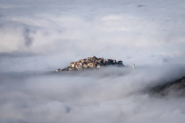 Mist enveloping Sant'Antonino in Corsica stock photo