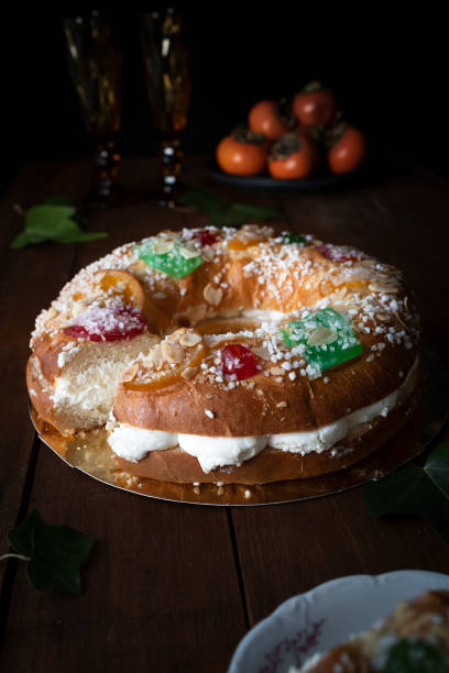 istock King cake with cream and fruit. Typical Christmas sweet in Spain 1362225437