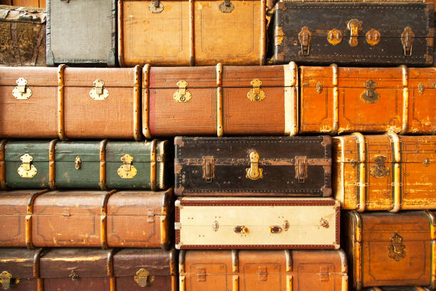 istock Old stacked suitcases, vintage travel background 1362228593