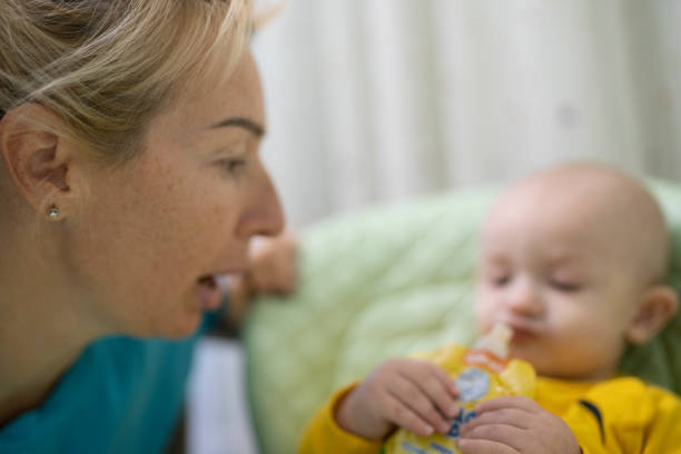 istock Young mother playing with her little son 1362230723