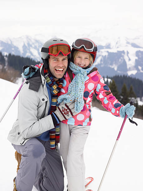 istock Young Father And Daughter On Ski Vacation 136223224
