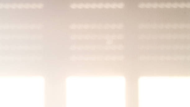 istock Shadows on wall. Abstract light, black shadow overlay from window on white texture wall. Sunlight architecture background. For product presentation, backdrop and mockup, summer seasonal concept. 1362232423
