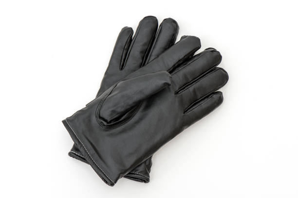 istock Black leather gloves on the white background. 1362233165