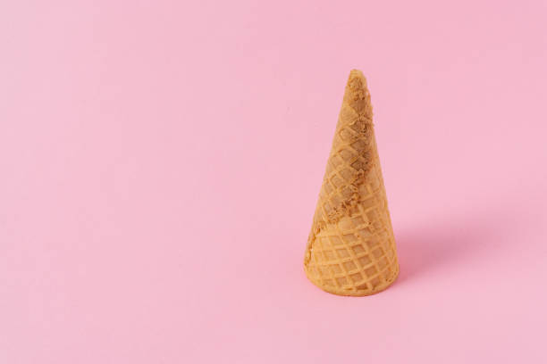 istock Ice cream cone on a light pink background. 1362233482