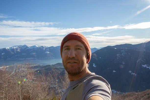 istock Male hiker taking selfie on mountain top 1362234413