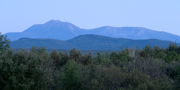 A panoramic of Maine's Iconic Mount Katahdin as dawn is about to break.
