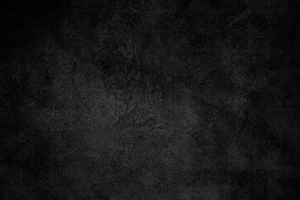 istock Black concrete plaster wall with rough grunge texture for background 1362243778