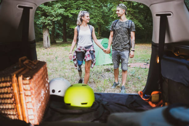 istock Young couple at road trip with car 1362244901