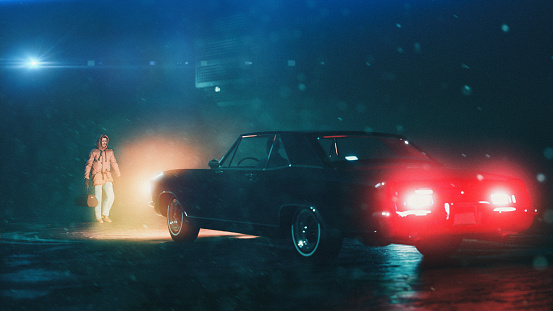 One man carries a bag and one man waits in a vintage car. The suspicious meeting takes place at night while it rains. Digitally generated image.