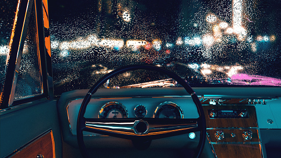 Digitally generated image of the inside of an vintage car with old steering wheel. Concept of a film noir scene at night with city lights and rain.