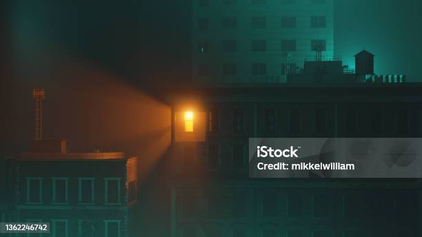 City At Night Where Light Shines From One Window Stock Photo - Download Image Now - Light - Natural Phenomenon, Window, Building Exterior