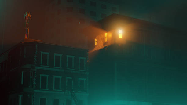 istock Electric light shines from apartment in a city at night 1362246745